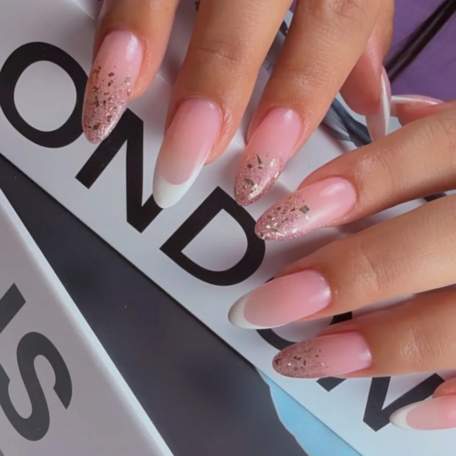 Almond builder gel nails in soft pink with accent nail art at Yudy's Queen Nails in Palm Beach Gardens