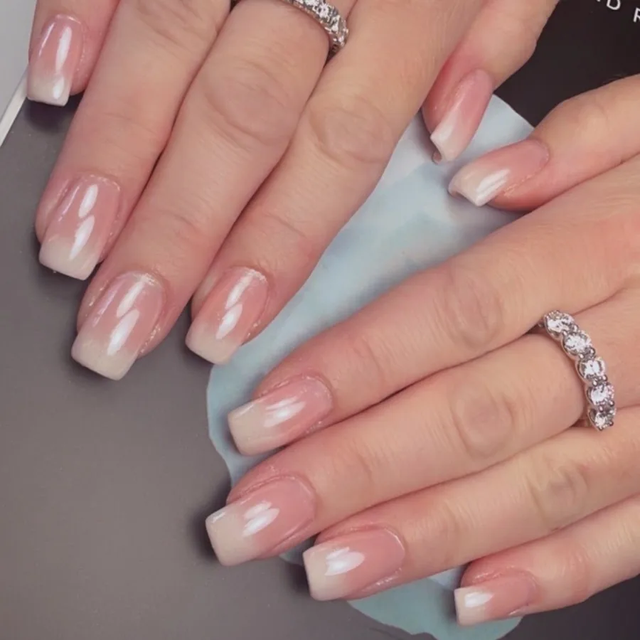Square builder gel nails in a soft pink and white ombre at Yudy's Queen Nails in Palm Beach Gardens