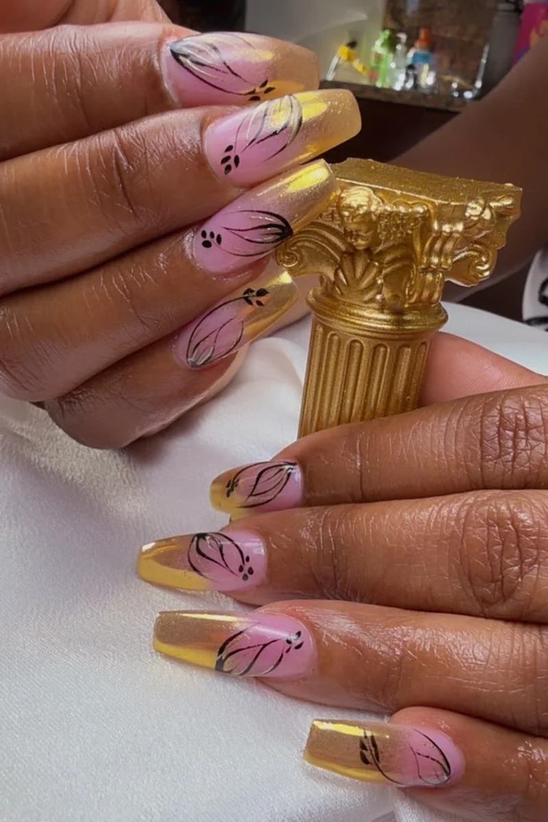 Hand painted floral coffin acrylic set by Yudy's Queen Nails in Palm Beach Gardens